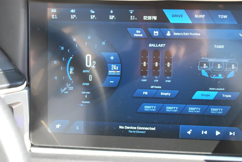 Slide: The Image of 2025 MasterCraft XT25 dashboard display showing speed, ballast, and tabs settings. - 8