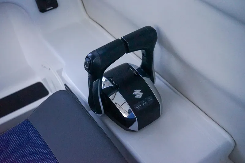 Slide: The Image of Throttle control of 2025 C-Dory 25' Tomcat Catamaran, featuring dual handles. - 10