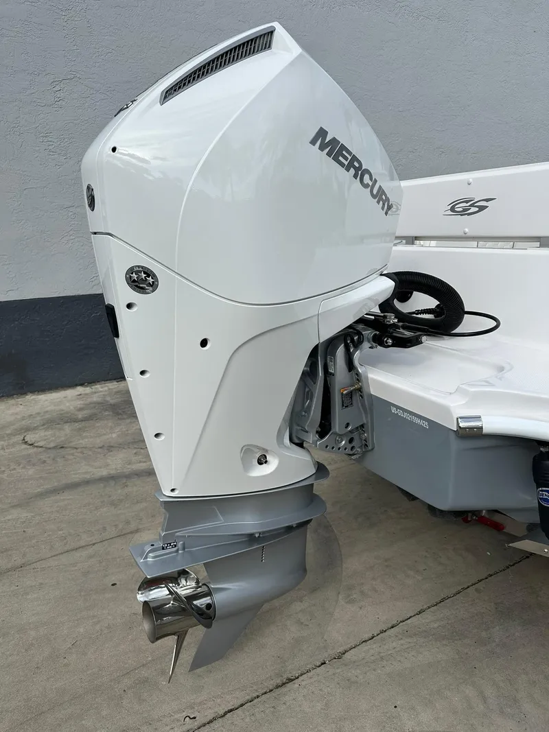 Slide: The Image of 2025 Glasstream 240 CCX with Mercury outboard motor, side view. - 11