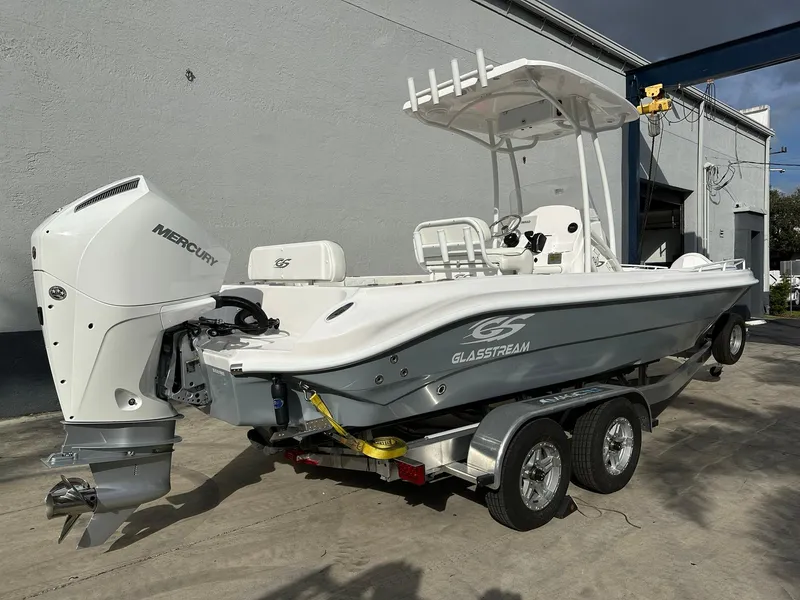 Slide: The Image of 2025 Glasstream 240 CCX boat on trailer with Mercury outboard engine. - 5