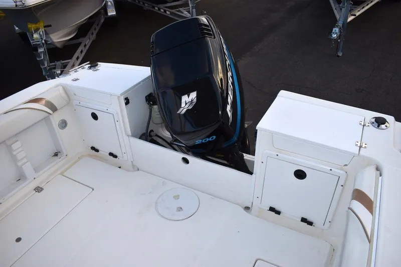 Slide: The Image of 2001 Aquasport 215 Explorer Walk-around boat with powerful outboard motor. - 14