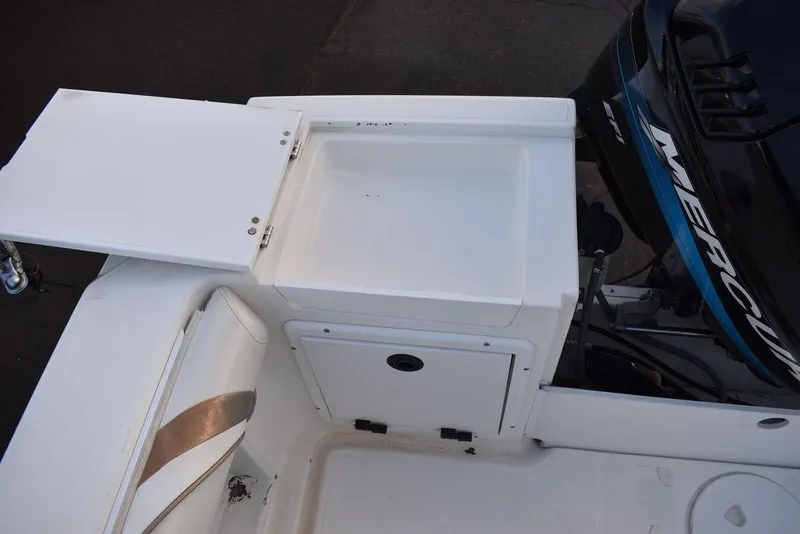 Slide: The Image of 2001 Aquasport 215 Explorer Walk-around boat with Mercury engine and storage compartment. - 18