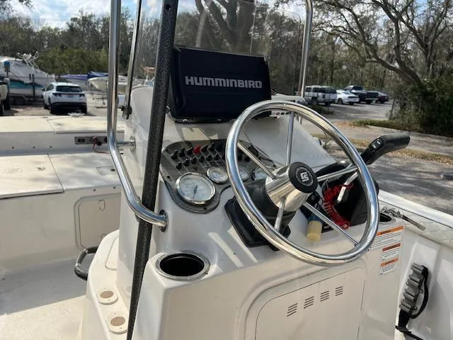 Slide: The Image of 2023 Carolina Skiff 19 LS boat console with steering wheel and Humminbird electronics. - 3