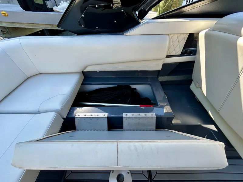 Slide: The Image of 2021 Cruisers Yachts 338 South Beach Edition Bow Rider interior storage compartment. - 34