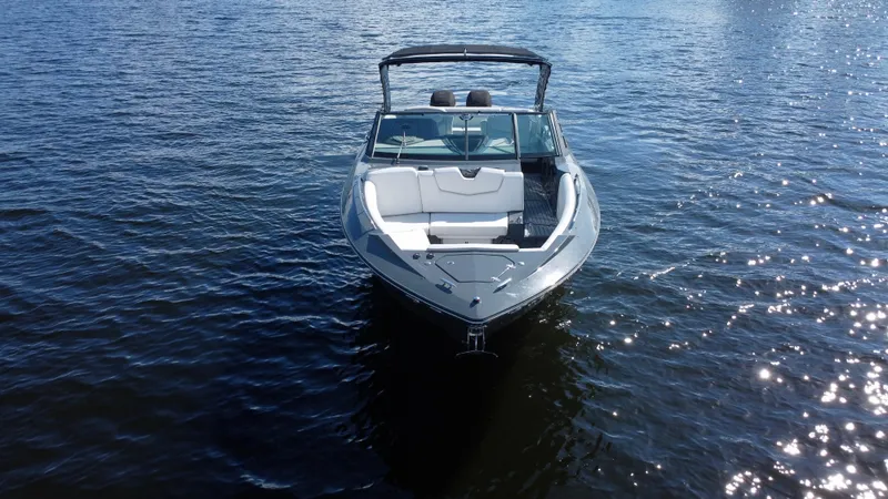 Slide: The Image of 2021 Cruisers Yachts 338 South Beach Edition Bow Rider on calm water. - 5