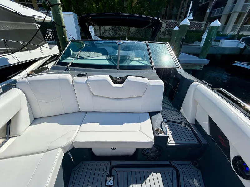 Slide: The Image of 2021 Cruisers Yachts 338 South Beach Edition Bow Rider with luxurious seating and sleek design. - 14