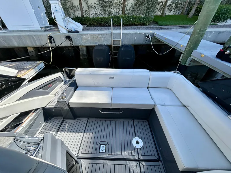 Slide: The Image of 2021 Cruisers Yachts 338 South Beach Edition Bow Rider with spacious seating and modern design. - 32