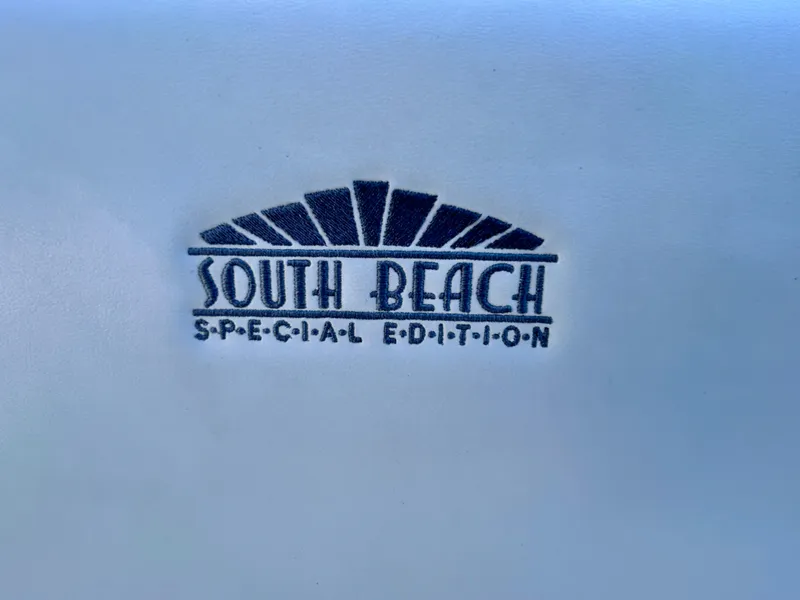 Slide: The Image of South Beach Special Edition logo on 2021 Cruisers Yachts 338 Bow Rider. - 38