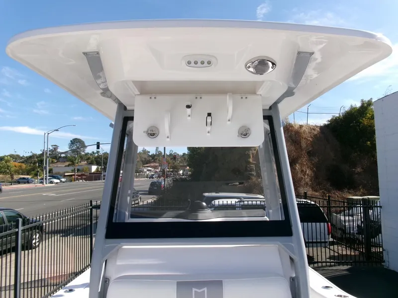 Slide: The Image of 2025 Sea Fox 228 Commander boat console with T-top and street view. - 14