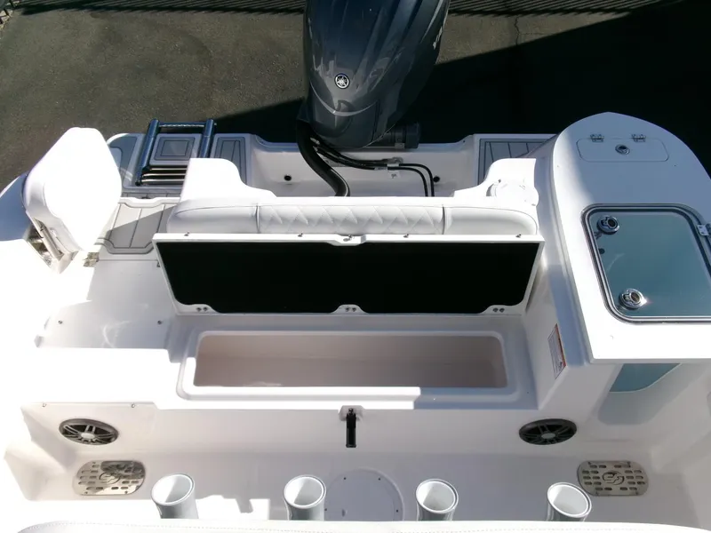 Slide: The Image of 2025 Sea Fox 228 Commander boat interior with seating and storage compartments. - 27