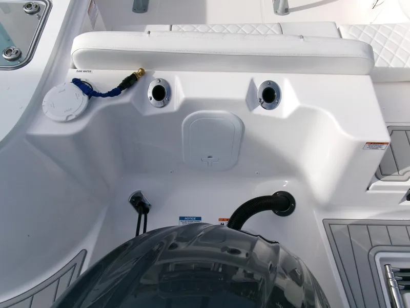Slide: The Image of 2025 Sea Fox 228 Commander boat interior with seating and engine details. - 31