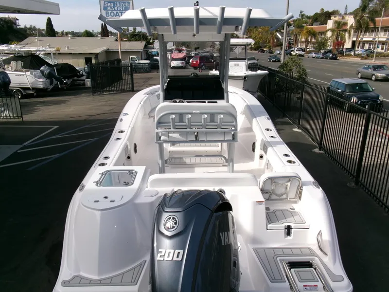 Slide: The Image of 2025 Sea Fox 228 Commander boat with Yamaha 200 engine, displayed at a dealership. - 36