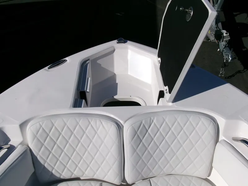 Slide: The Image of 2025 Sea Fox 228 Commander boat with open storage compartment and quilted seating. - 4