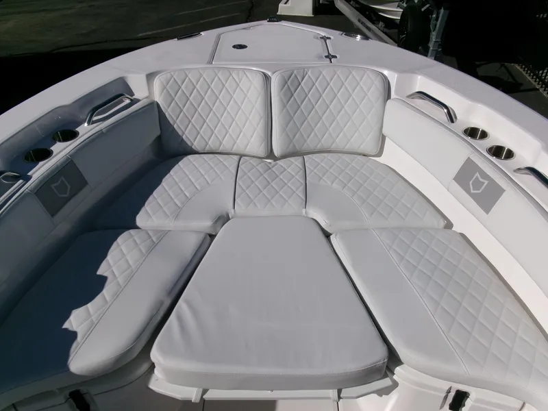 Slide: The Image of 2025 Sea Fox 228 Commander boat with luxurious white cushioned seating. - 8