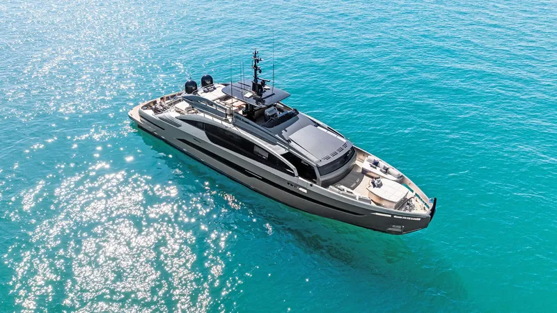 Slide: The Image of 2023 Pershing GTX 116 yacht cruising on clear blue water. - 13