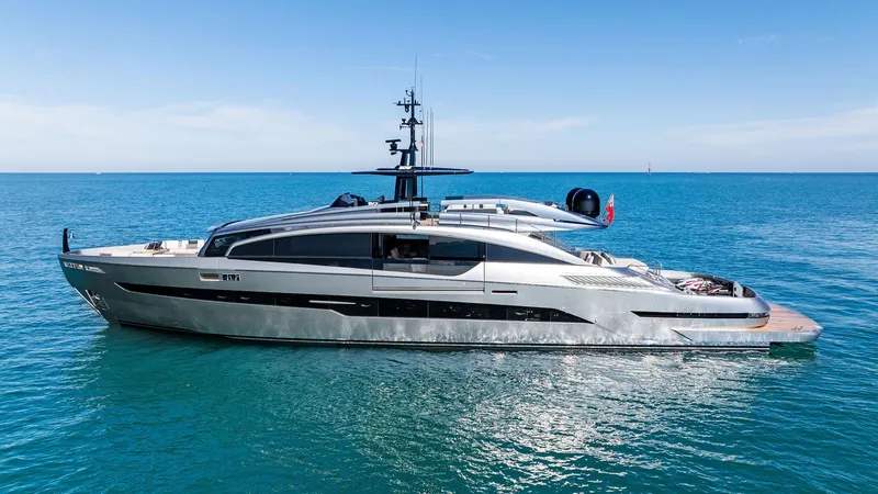 Slide: The Image of Luxury 2023 Pershing GTX 116 yacht on calm blue sea. - 6