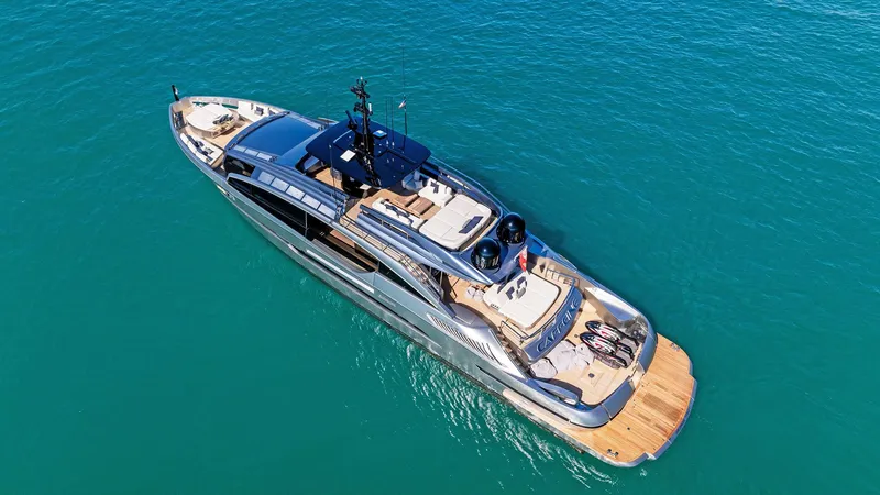 Slide: The Image of 2023 Pershing GTX 116 yacht on clear blue water, aerial view. - 7