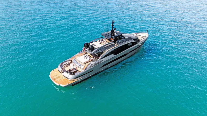 Slide: The Image of Luxurious 2023 Pershing GTX 116 yacht cruising on clear blue ocean waters. - 9