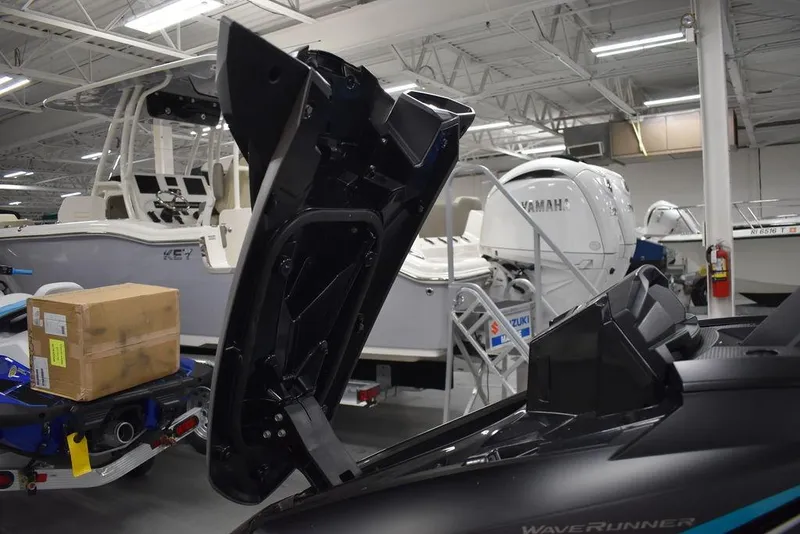 Slide: The Image of 2023 Yamaha WaveRunner VX Cruiser® in showroom with open storage compartment. - 26