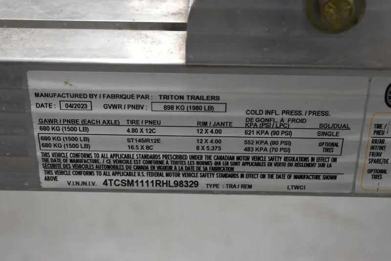 Slide: The Image of 2023 Yamaha WaveRunner VX Cruiser® trailer label with specifications and tire information. - 33