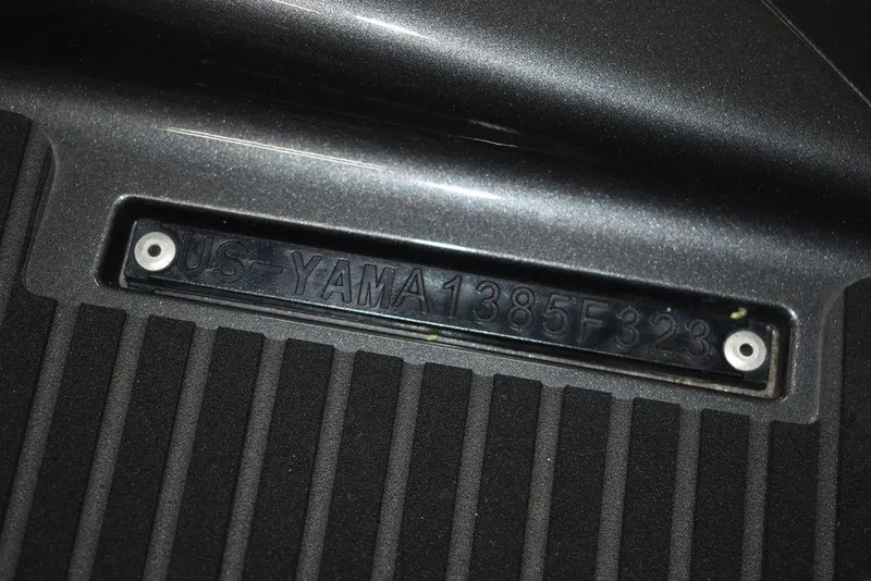 Slide: The Image of 2023 Yamaha WaveRunner VX Cruiser® serial number plate on black surface. - 34