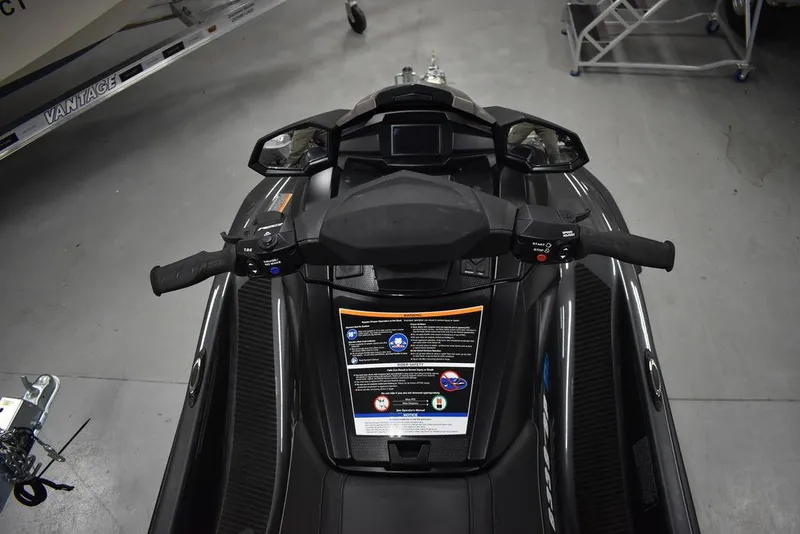 Slide: The Image of 2023 Yamaha WaveRunner VX Cruiser® dashboard and handlebars in a showroom setting. - 6