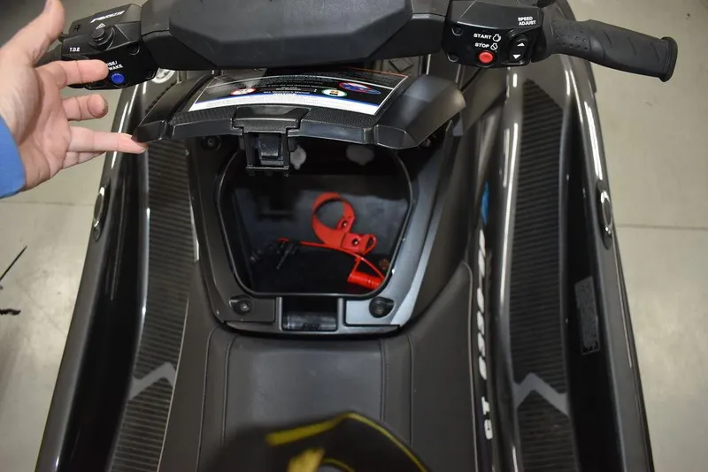 Slide: The Image of 2023 Yamaha WaveRunner VX Cruiser® storage compartment with handlebars and controls visible. - 7