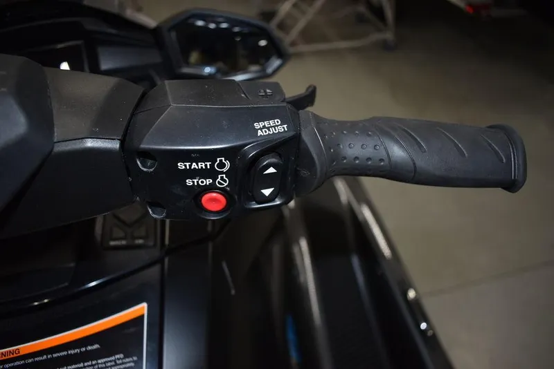 Slide: The Image of 2023 Yamaha WaveRunner VX Cruiser handlebar controls with start, stop, and speed adjust buttons. - 9