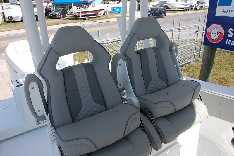 Slide: The Image of 2025 Cape Horn 28XS boat seats, featuring modern gray upholstery and ergonomic design. - 13