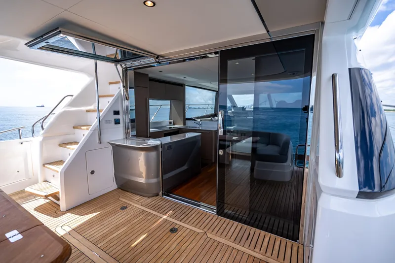 Slide: The Image of 2023 Princess F65 yacht interior with modern design and ocean view. - 10