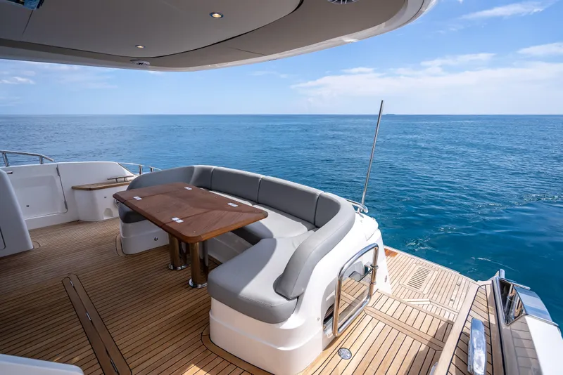 Slide: The Image of 2023 Princess F65 yacht deck with seating and ocean view. - 14
