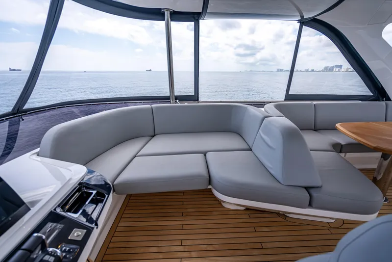 Slide: The Image of Luxurious 2023 Princess F65 yacht interior with elegant seating and ocean view. - 22