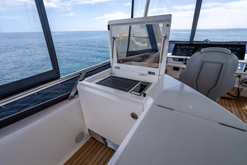 Slide: The Image of 2023 Princess F65 yacht interior with grill and ocean view. - 25
