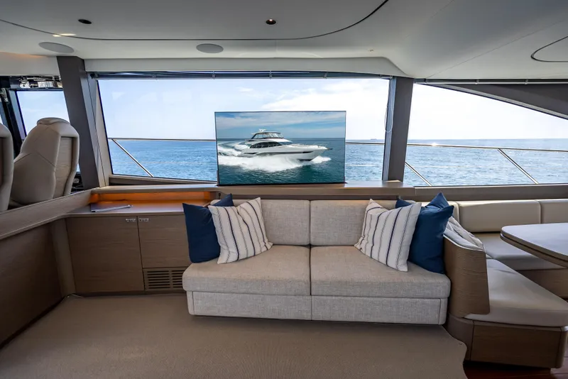Slide: The Image of Luxurious interior of 2023 Princess F65 yacht with ocean view and elegant seating. - 32