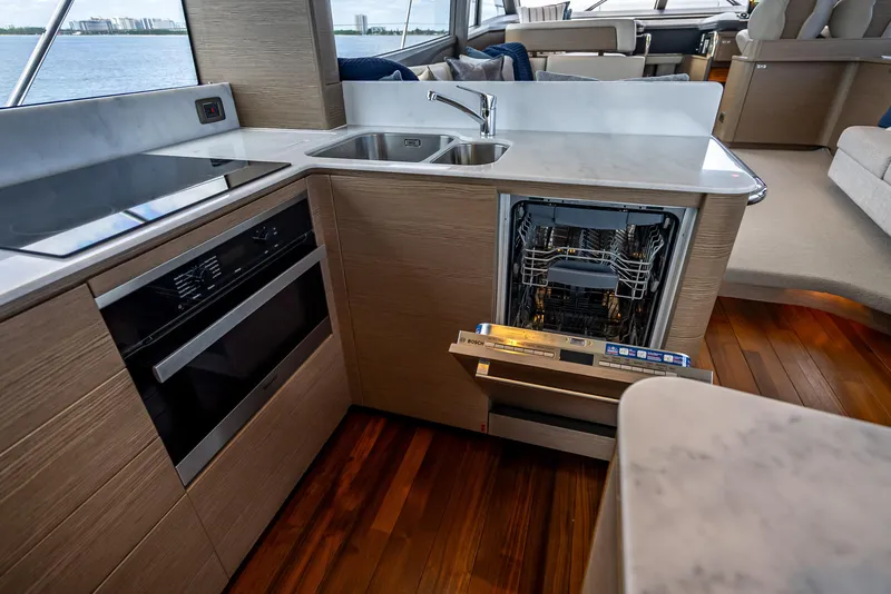 Slide: The Image of Modern kitchen in 2023 Princess F65 yacht with dishwasher and sleek design. - 34
