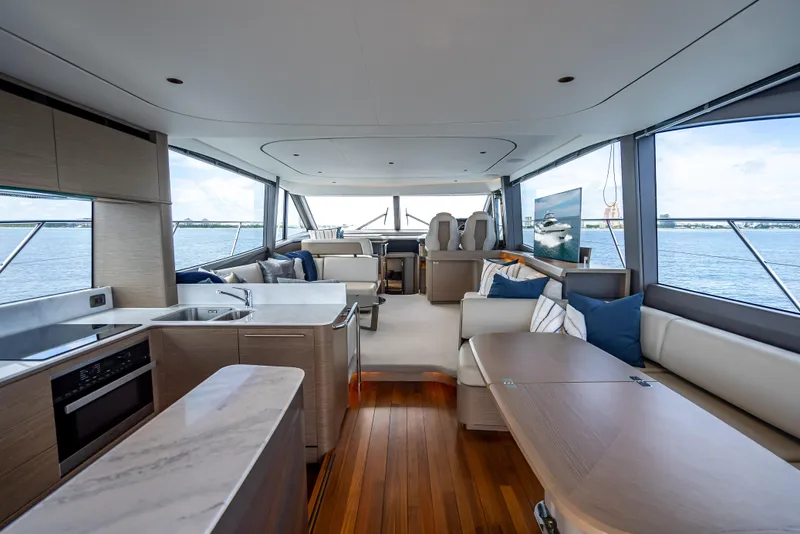Slide: The Image of Luxurious interior of 2023 Princess F65 yacht with modern furnishings and panoramic windows. - 35