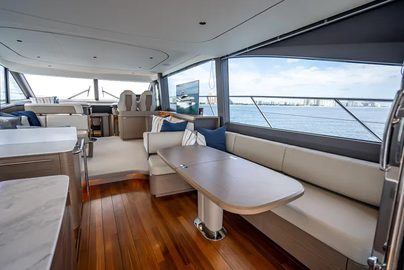 Slide: The Image of Luxurious interior of 2023 Princess F65 yacht with elegant seating and ocean view. - 36