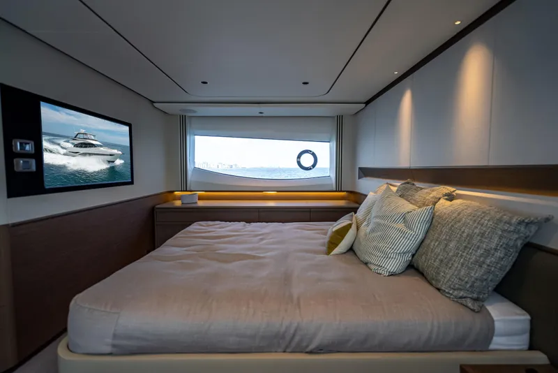 Slide: The Image of Luxurious bedroom interior of 2023 Princess F65 yacht with modern decor and ocean view. - 41
