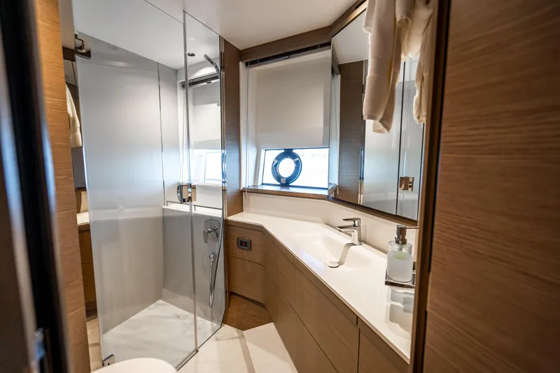 Slide: The Image of Luxurious bathroom in 2023 Princess F65 yacht with modern fixtures and elegant design. - 45