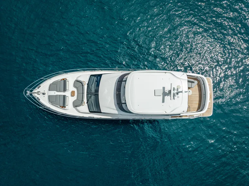 Slide: The Image of Aerial view of 2023 Princess F65 yacht on blue ocean water. - 8
