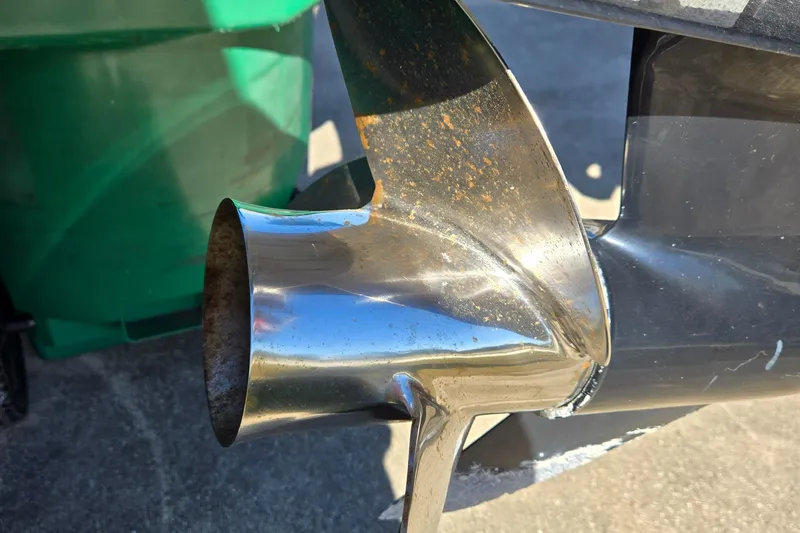 Slide: The Image of Close-up of a 2017 Regency 254 LE3 boat propeller with slight rust. - 16