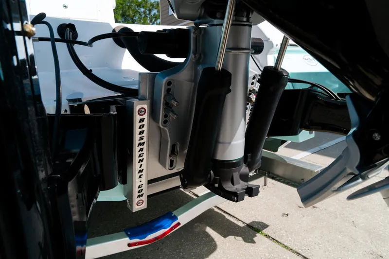 Slide: The Image of 2025 Caymas 28 HB boat engine mount detail with hydraulic components. - 8