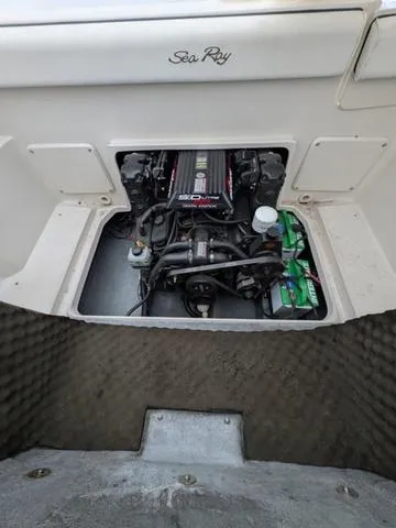 Slide: The Image of Engine compartment of a 1999 Sea Ray 215 Express Cruiser boat. - 6