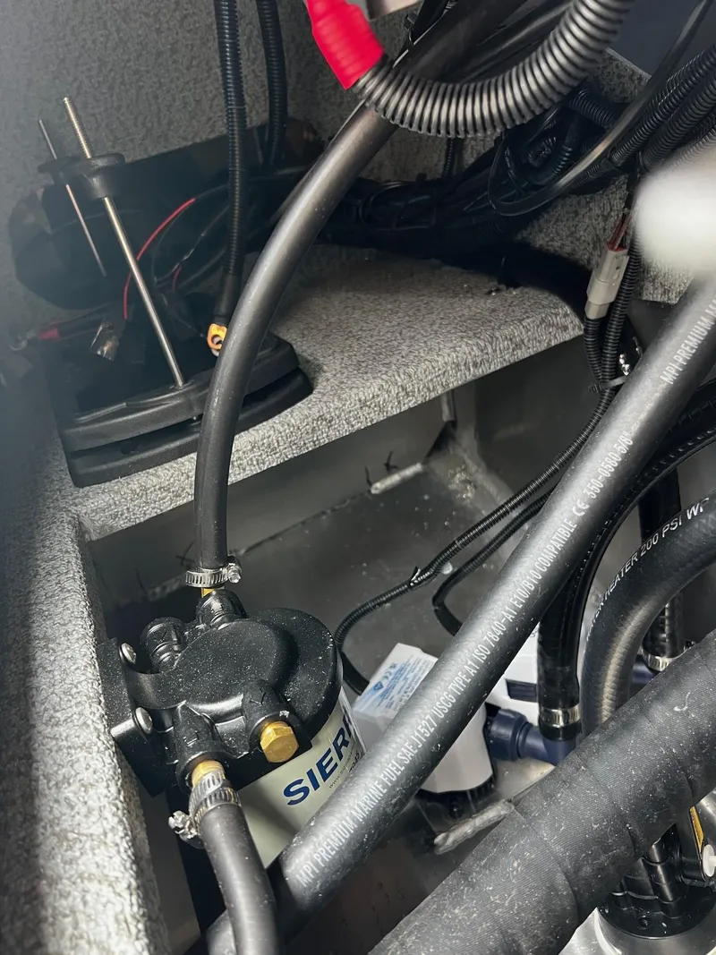 Slide: The Image of 2025 Thunder Jet 210 Luxor engine compartment with visible wiring and components. - 36