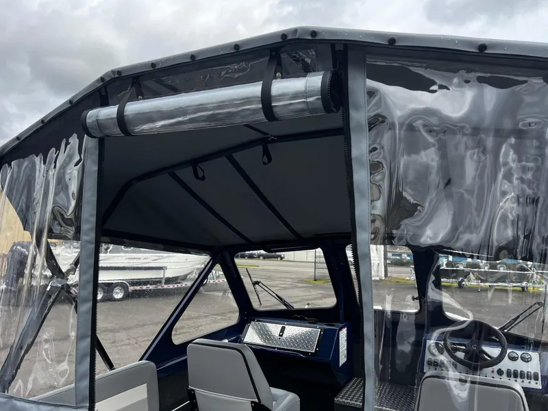 Slide: The Image of 2025 Thunder Jet 210 Luxor boat interior with clear canopy and modern dashboard. - 40