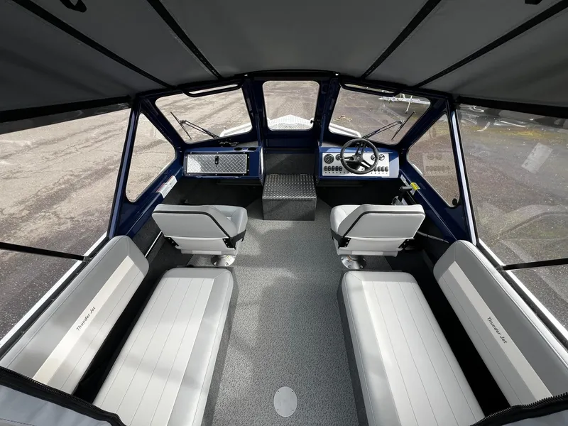 Slide: The Image of Interior of 2025 Thunder Jet 210 Luxor boat with seating and steering console. - 42