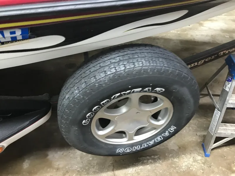 Slide: The Image of Goodyear Marathon tire on a 2004 Ranger 519 VX/VS boat trailer. - 13