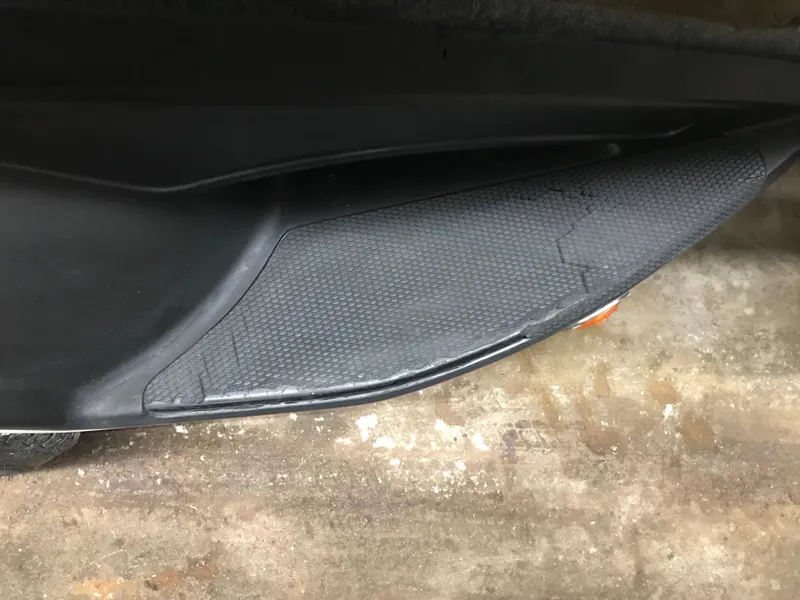 Slide: The Image of 2004 Ranger 519 VX/VS boat hull detail on concrete floor. - 14