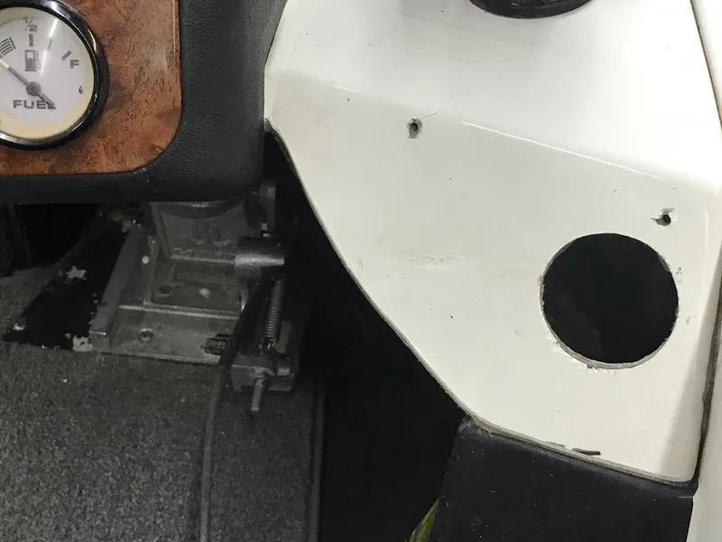 Slide: The Image of Dashboard detail of a 2004 Ranger 519 VX/VS boat with fuel gauge. - 35