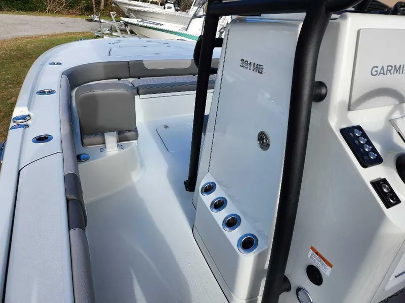 Slide: The Image of 2025 Caymas 281 HB boat interior with seating and control panel. - 13